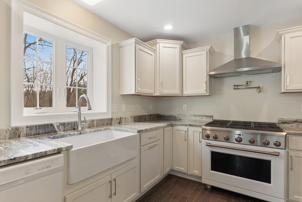 213 Worcester Road Princeton, MA 01541 - Photo 14 of 36 a kitchen with stainless steel appliances granite countertop a sink stove and cabinets