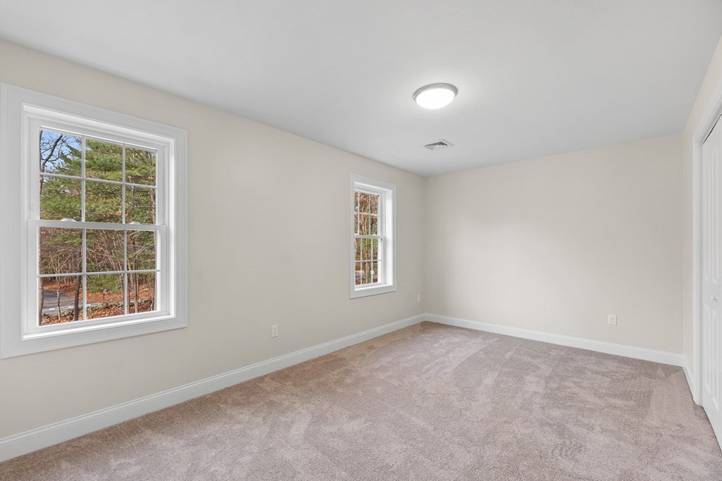 213 Worcester Road Princeton, MA 01541 - Photo 25 of 36 an empty room with a window