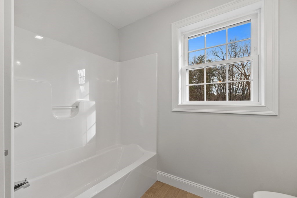 213 Worcester Road Princeton, MA 01541 - Photo 30 of 36 a bathroom with a bathtub and shower