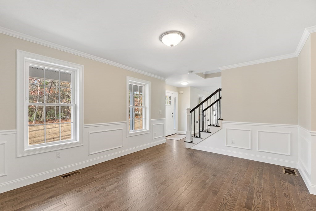213 Worcester Road Princeton, MA 01541 - Photo 6 of 36 a view of an entryway with wooden floor and windows