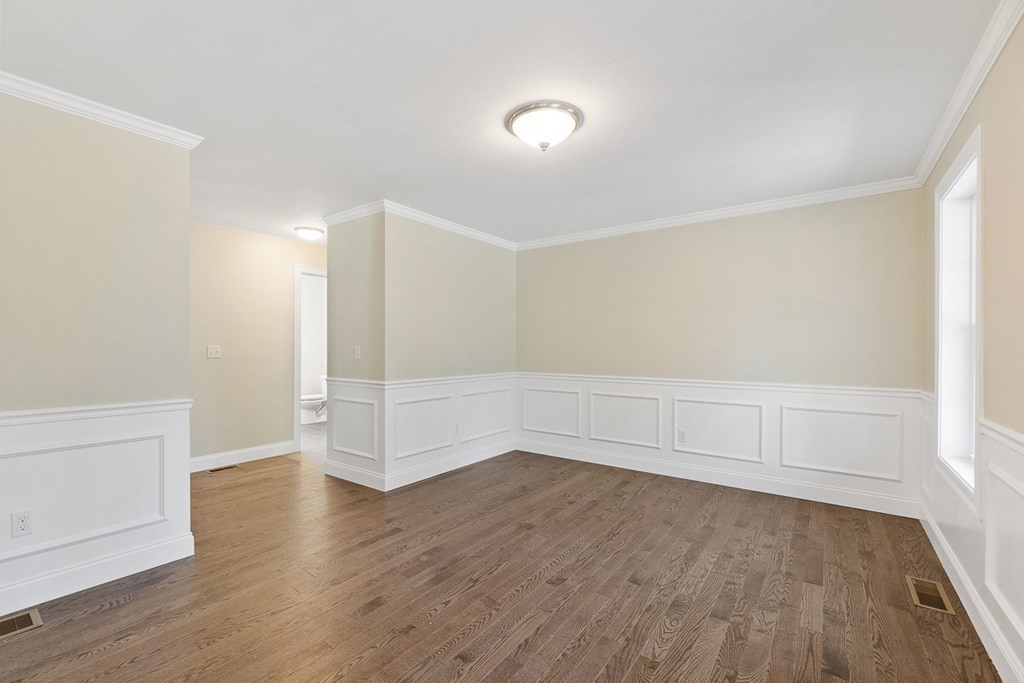 213 Worcester Road Princeton, MA 01541 - Photo 7 of 36 an empty room with wooden floor