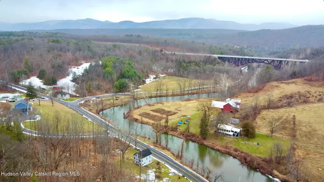a view of a balcony with an outdoor seating