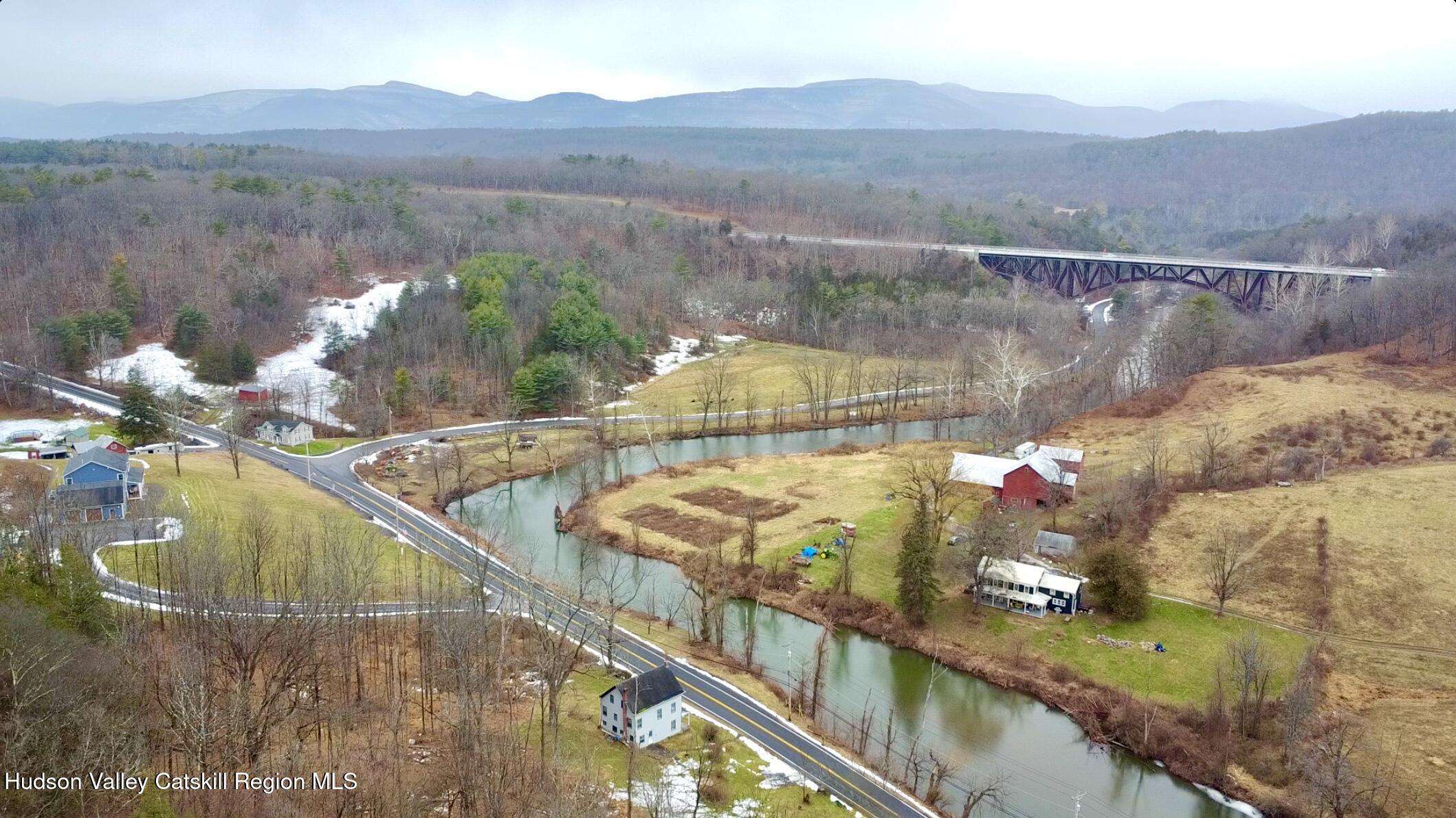 5208 Cauterskill Road Catskill, NY 12414 - Photo 18 of 23 a view of a balcony with an outdoor seating