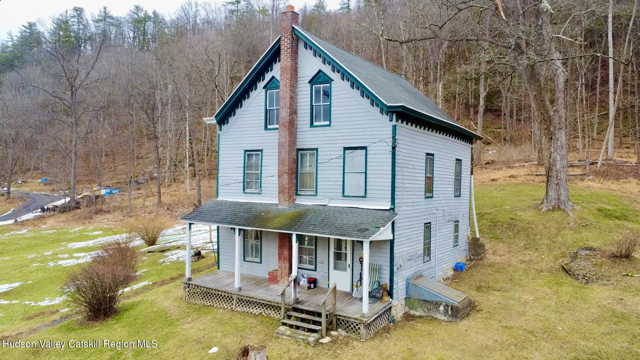 5208 Cauterskill Road Catskill, NY 12414 - Photo 3 of 23 a view of house with yard outdoor seating area and furniture