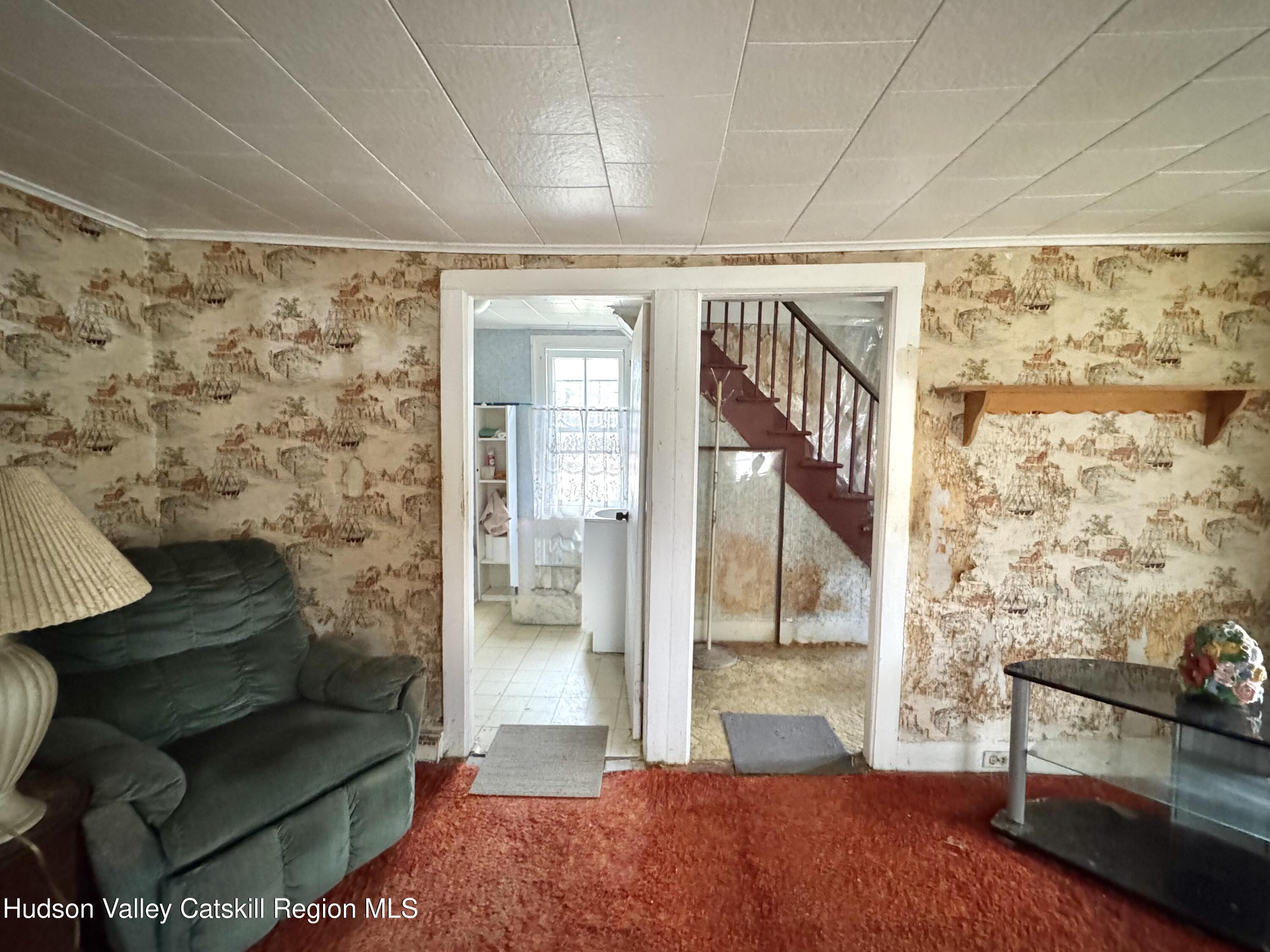 5208 Cauterskill Road Catskill, NY 12414 - Photo 7 of 23 a living room with furniture and a rug