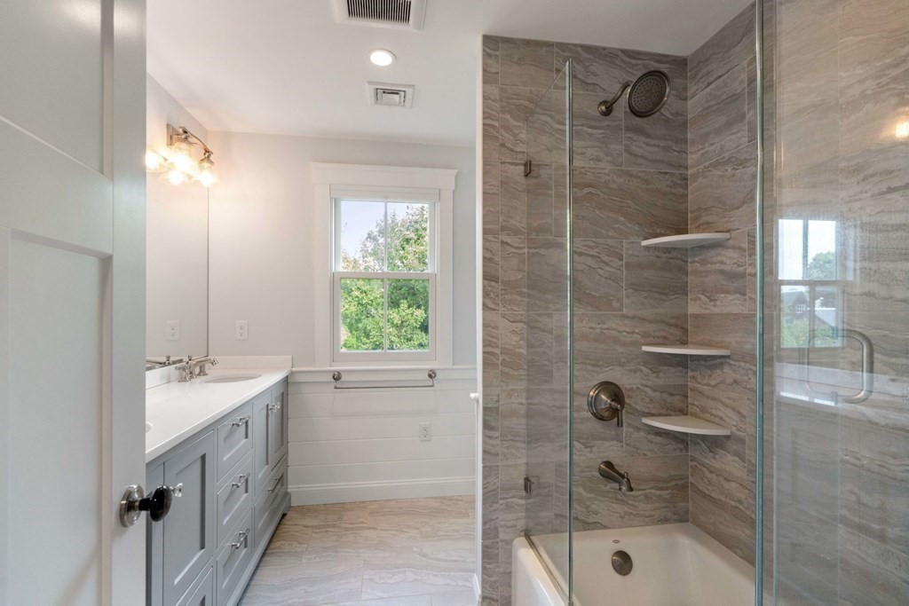 616 Hatherly Road Scituate, MA 02066 - Photo 21 of 34 a spacious bathroom with a shower and a sink