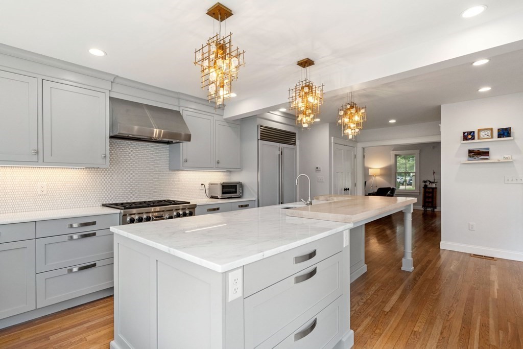 616 Hatherly Road Scituate, MA 02066 - Photo 4 of 34 a kitchen that has a lot of cabinets in it