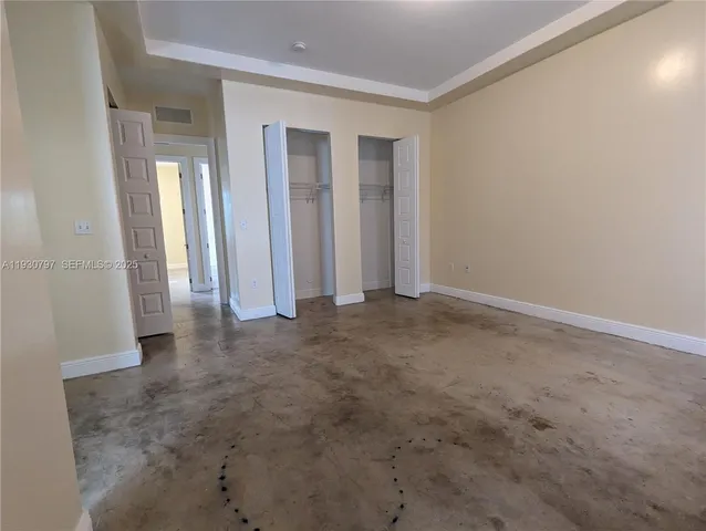 an empty room with windows