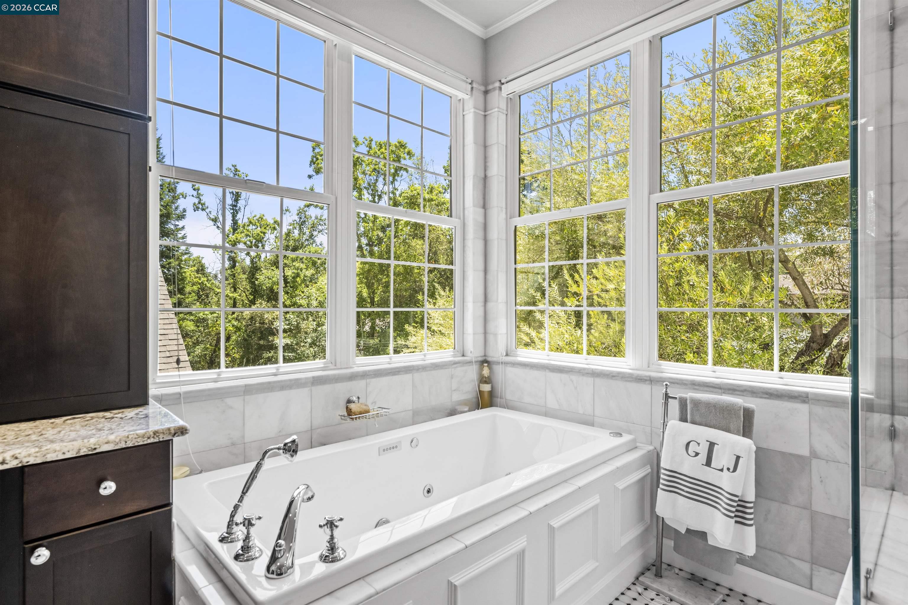 177 Oak Road Alamo, CA 94507 - Photo 30 of 85 a bathroom with a tub and a window