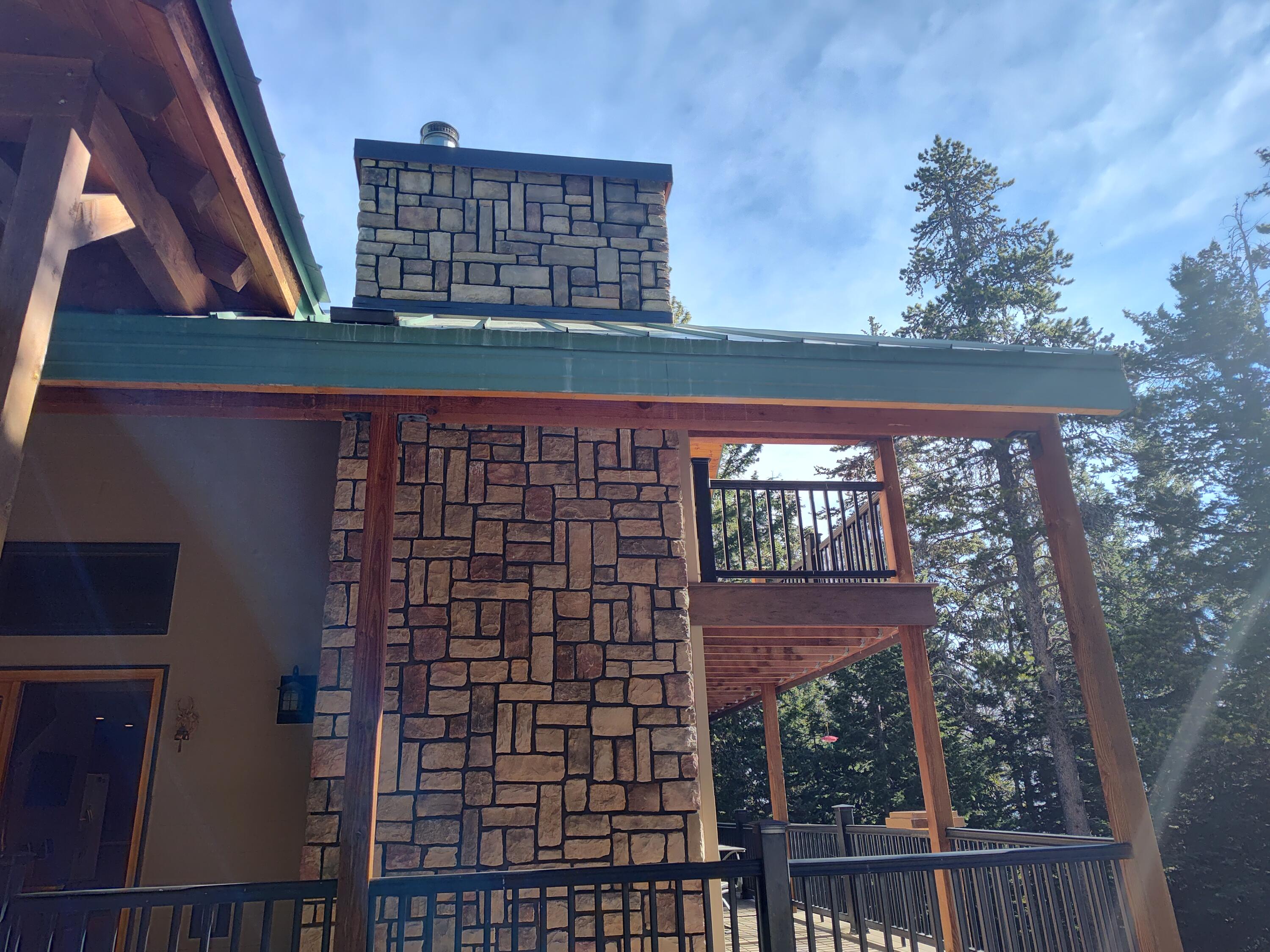 45 Blacktooth Road Sheridan, WY 82801 - Photo 10 of 47 Exterior fireplace