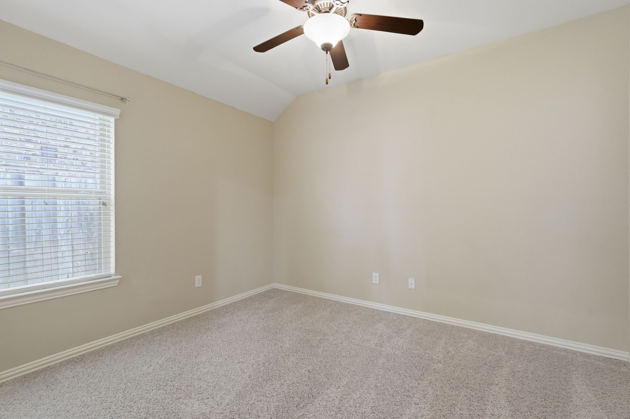 18227 Tacoma Ridge Drive Tomball, TX 77377 - Photo 29 of 45 Natural light fills this versatile bedroom, creating a warm and airy feel.