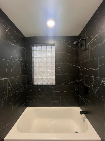 a bathroom with a bathtub