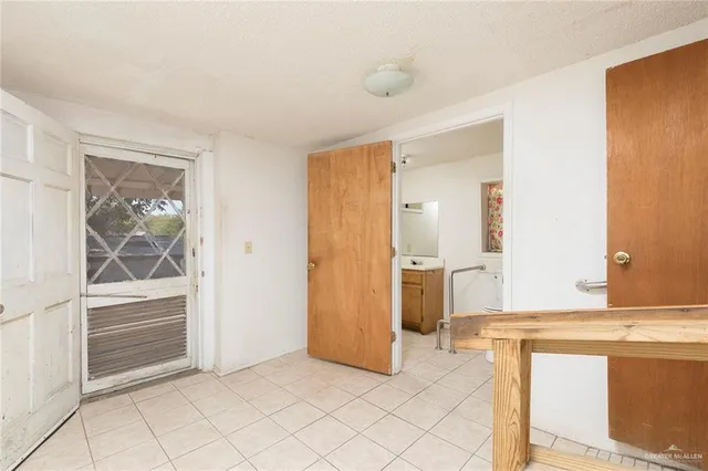 a view of front door with hallway
