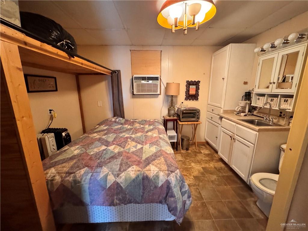 2112 Kelly Mission, TX 78572 - Photo 24 of 24 a bed room with a bed and furniture