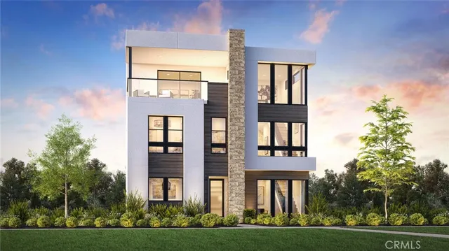 a view of a brick building next to a yard