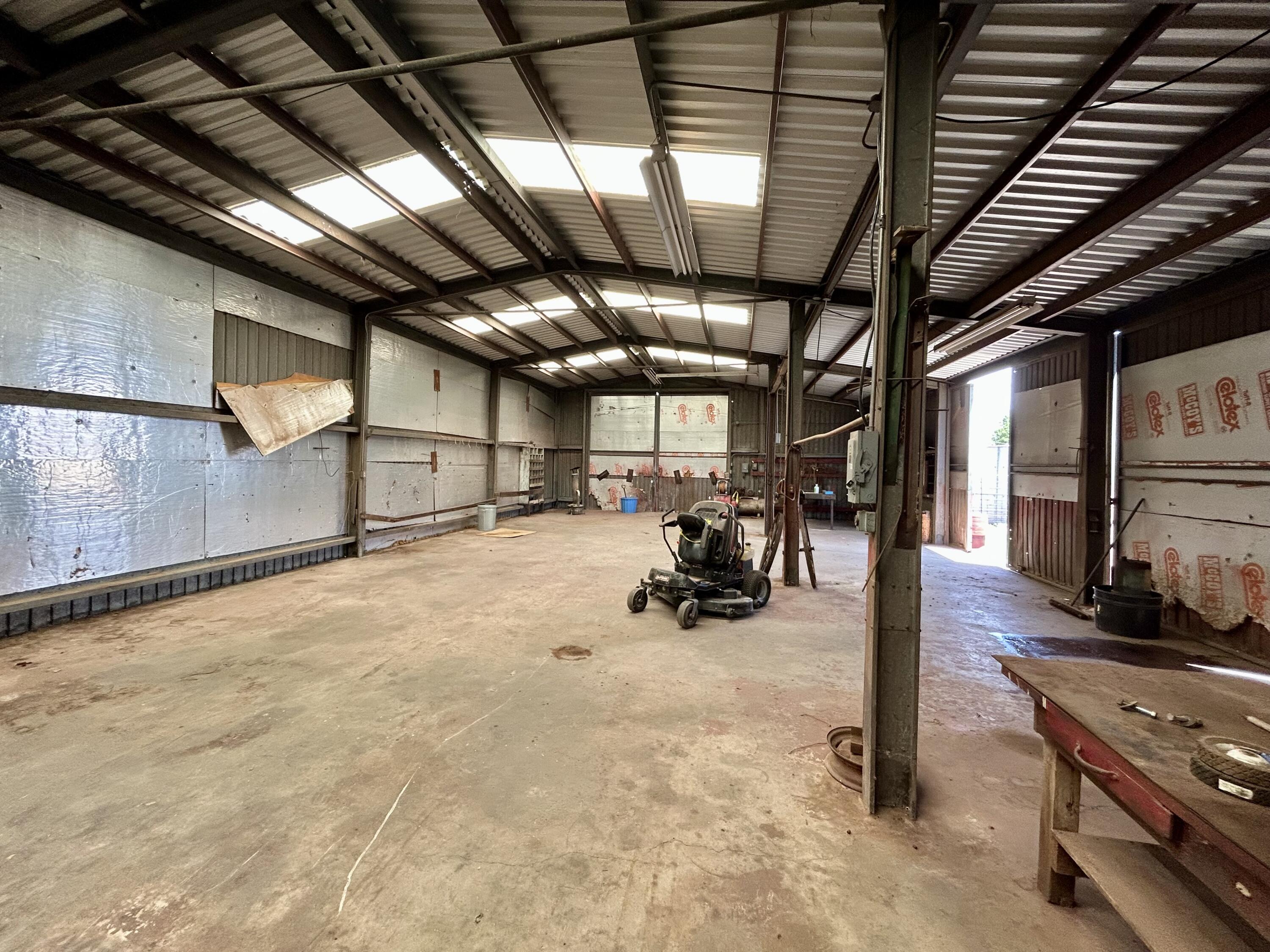 2101 Farm To Market 97 Lockney, TX 79241 - Photo 25 of 35 a view of a garage with furniture