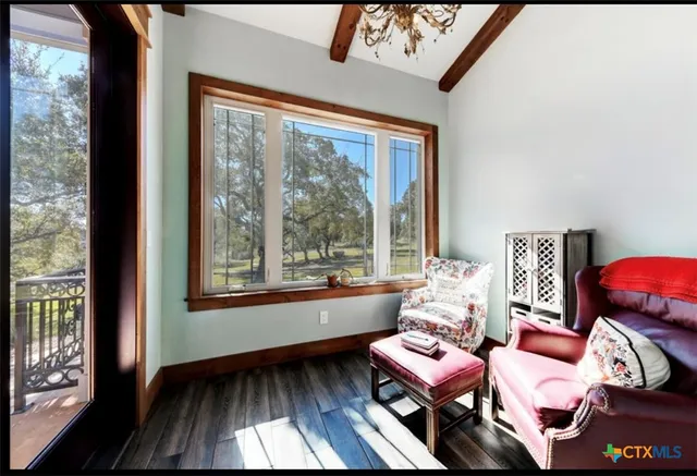 a spacious bathroom with a double vanity sink a mirror and a bathtub