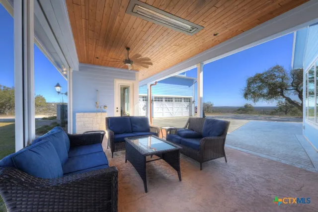 a view of an empty room with a fireplace