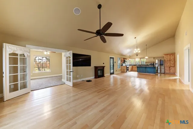 a large kitchen with a large stove top oven