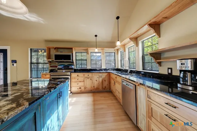 a view of a house with a street