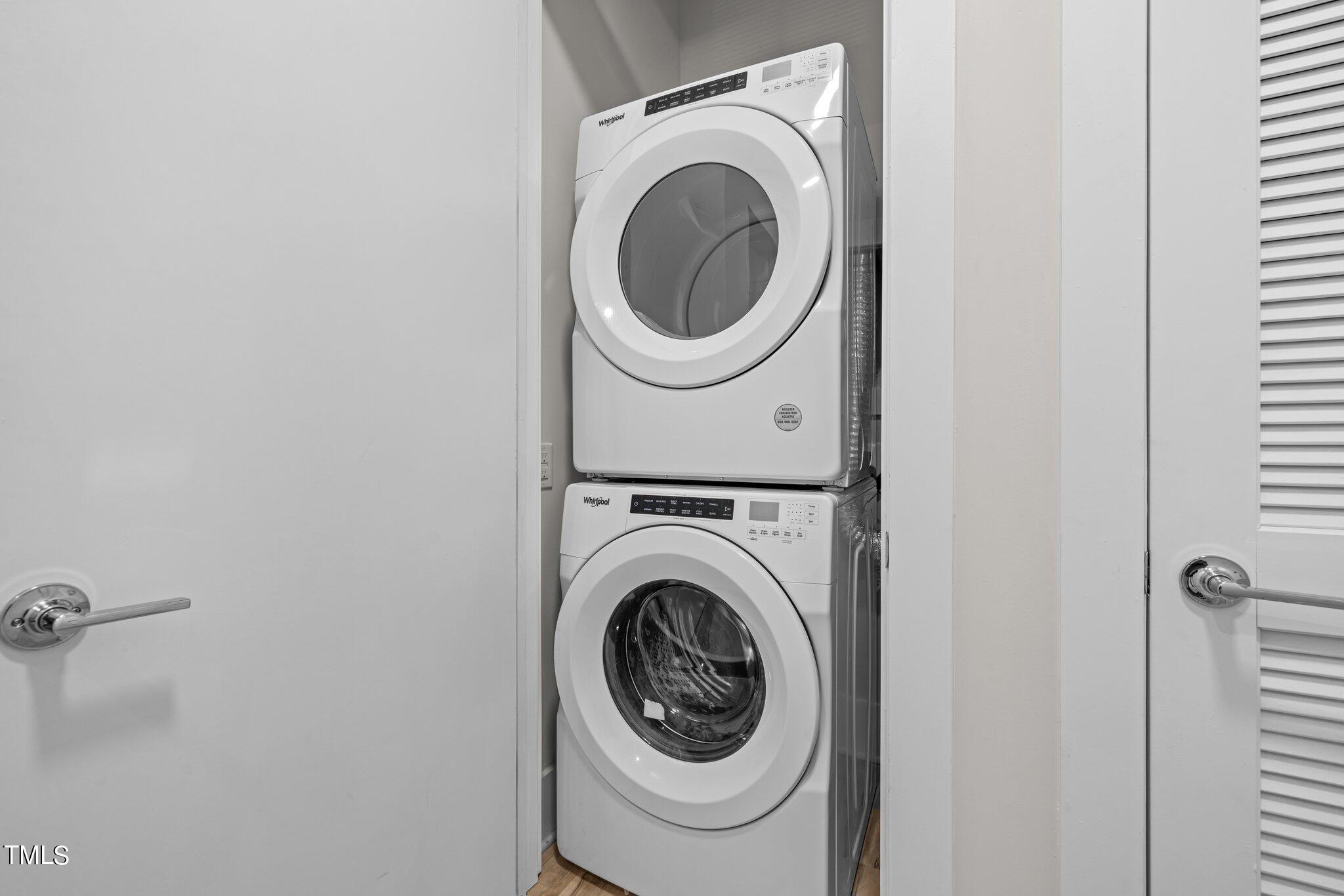 2441 Campus Shore Drive, Unit 312 Raleigh, NC 27606 - Photo 33 of 43 a utility room with dryer and washer