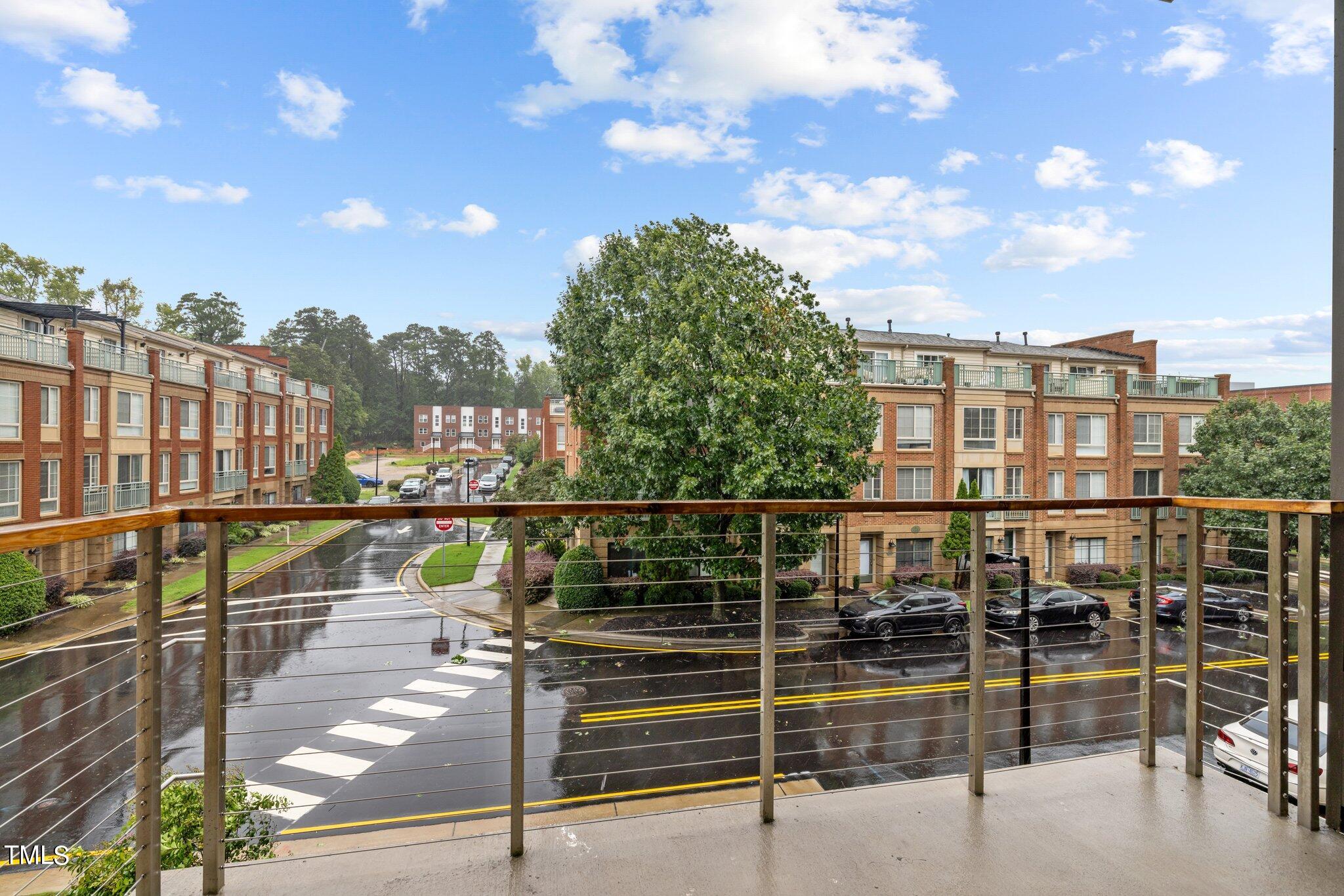 2441 Campus Shore Drive, Unit 312 Raleigh, NC 27606 - Photo 41 of 43 a view of city from a balcony