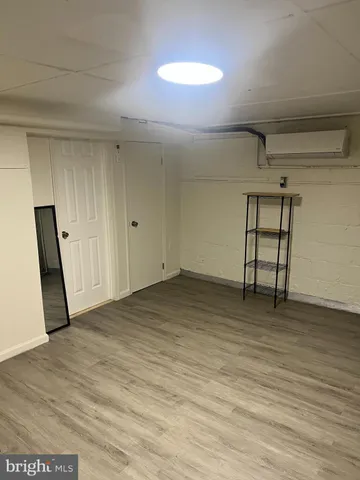 a view of a car park in front of house