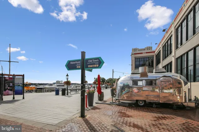 a view of a cafe with sitting area