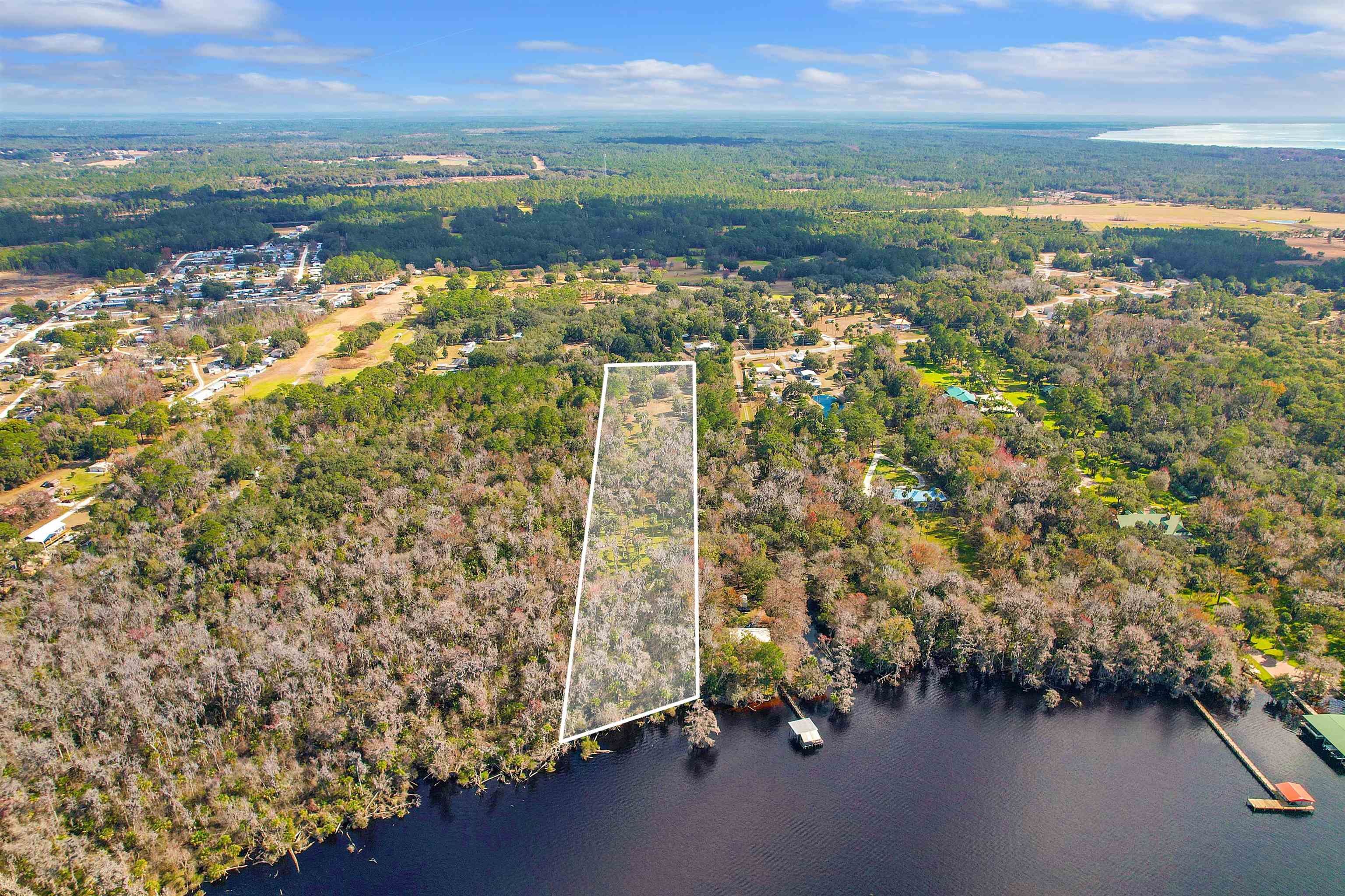 1249 County Rd Crescent, Unit 309 Crescent City, FL 32112 - Photo 17 of 23 a view of a city with an ocean view