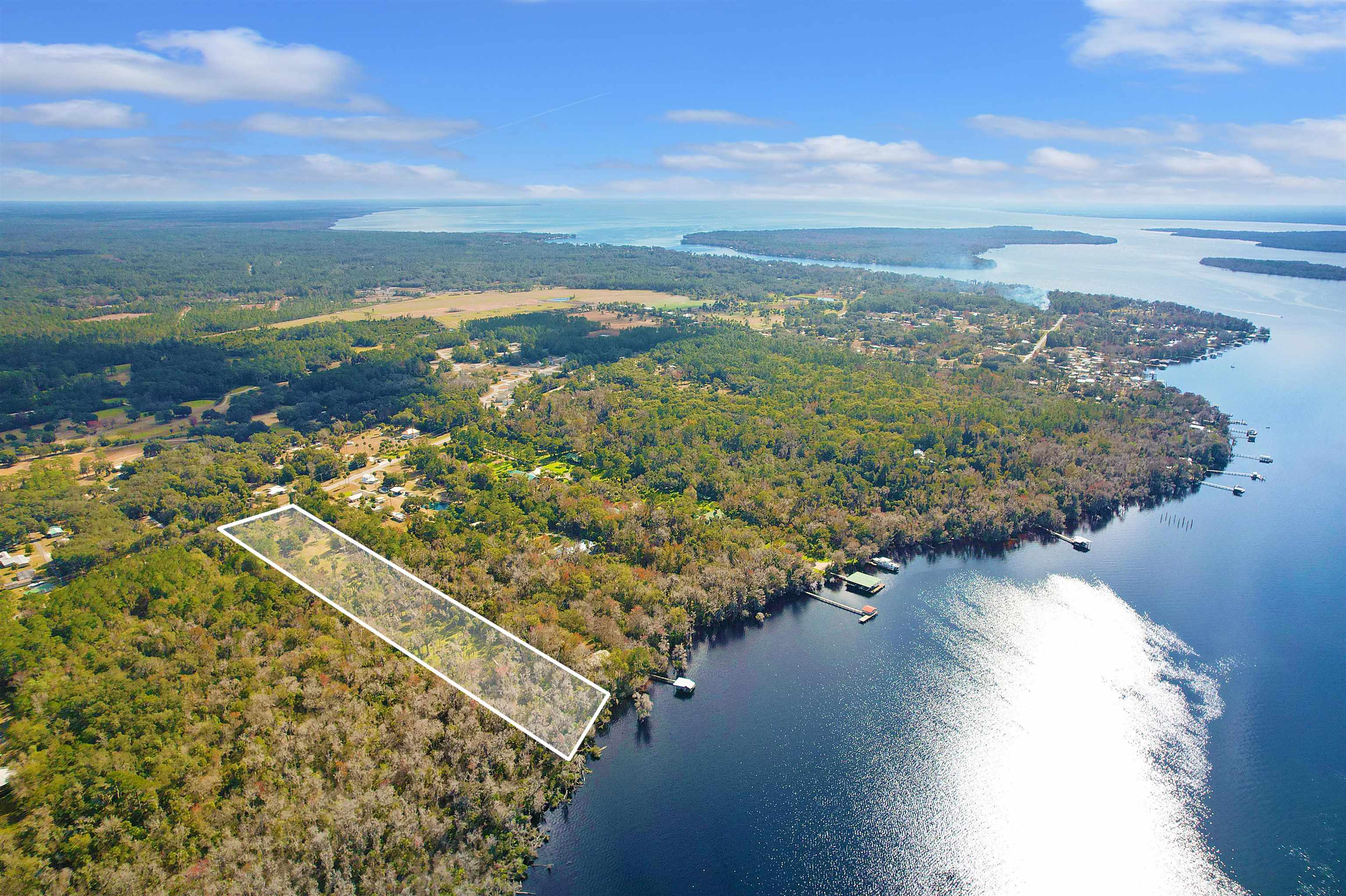 1249 County Rd Crescent, Unit 309 Crescent City, FL 32112 - Photo 5 of 23 a view of a lake with a mountain