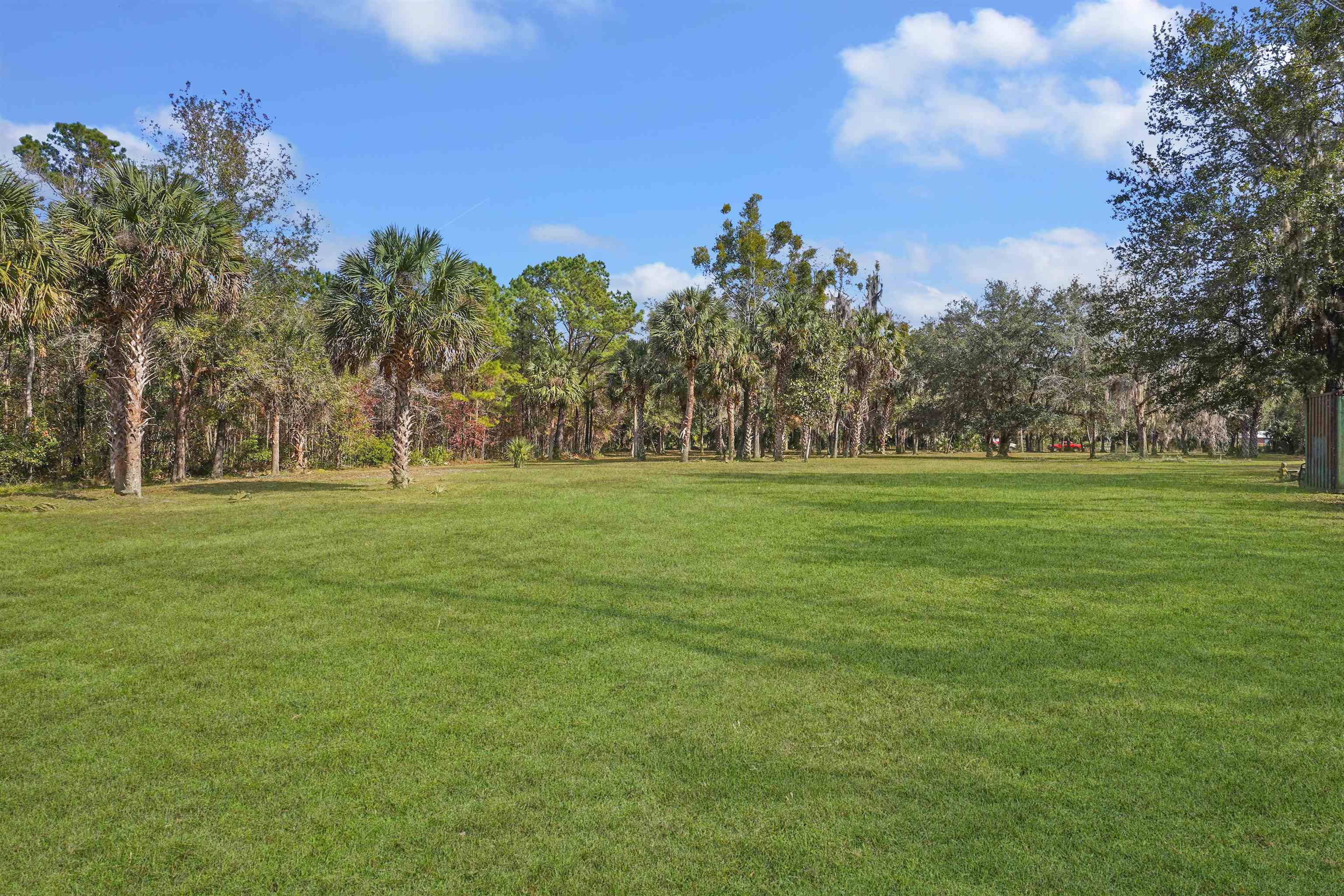 1249 County Rd Crescent, Unit 309 Crescent City, FL 32112 - Photo 10 of 23 a view of a golf course