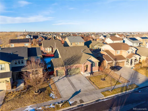 an aerial view of a house with sitting space