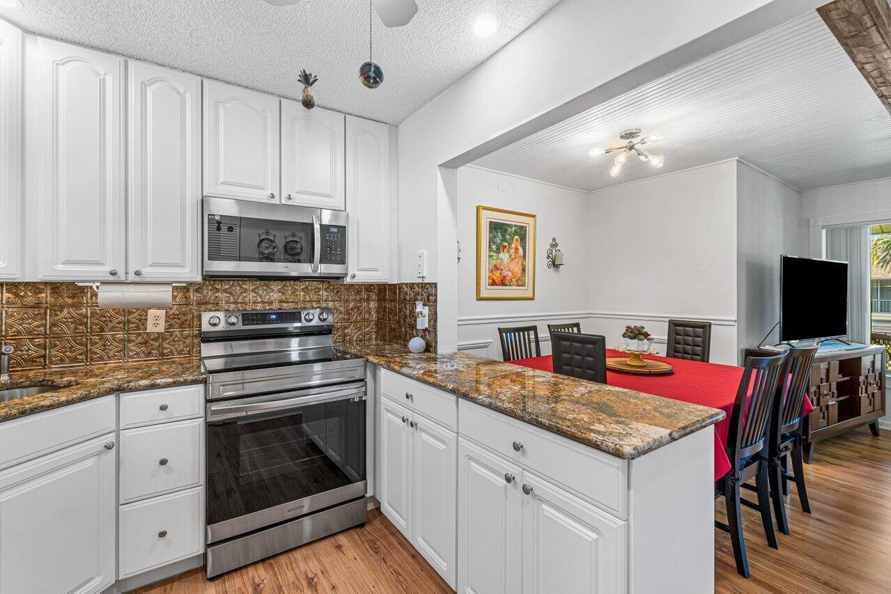 308 Pine Ridge Circle, Unit C2 Greenacres, FL 33463 - Photo 14 of 23 Kitchen