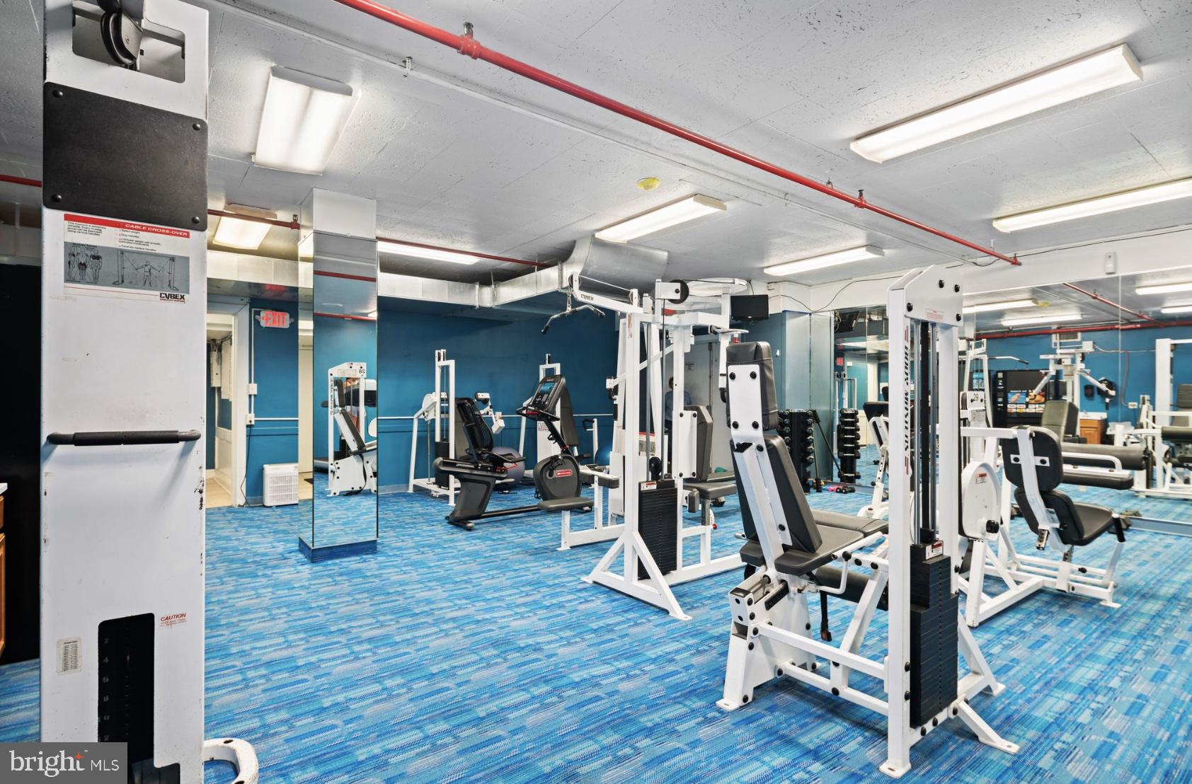 1324 Locust Street, Unit 619 Philadelphia, PA 19107 - Photo 12 of 19 a view of a room with gym equipment