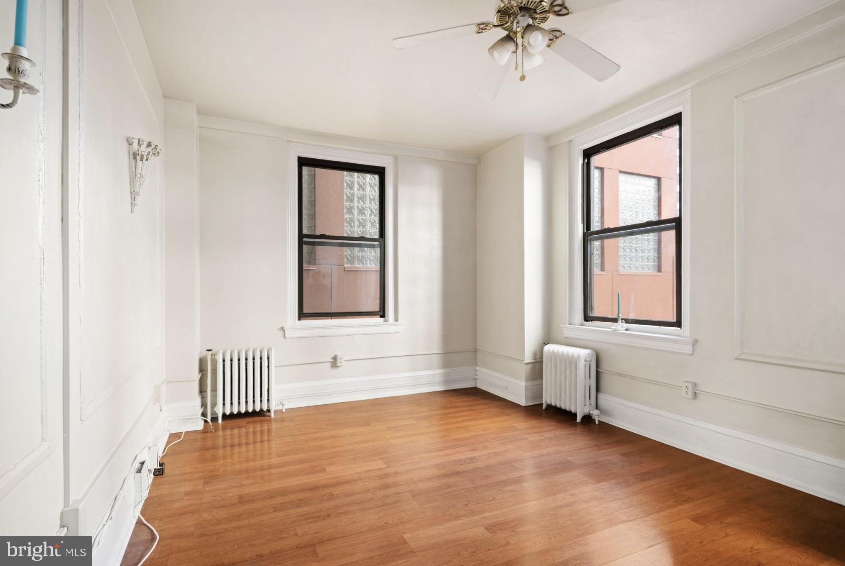 1324 Locust Street, Unit 619 Philadelphia, PA 19107 - Photo 6 of 19 a view of an empty room with a window