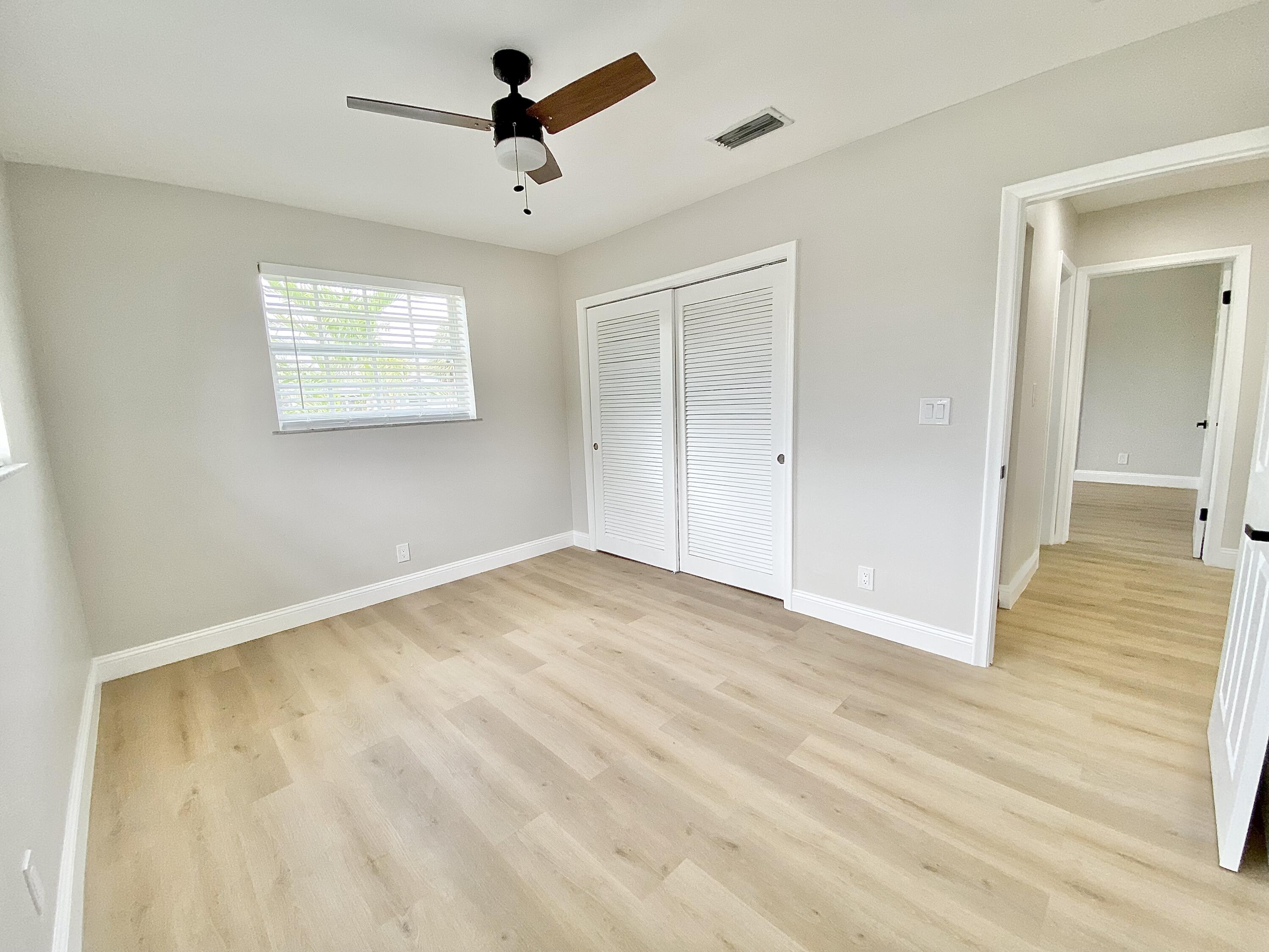 500 Southwest 3rd Avenue Boca Raton, FL 33432 - Photo 17 of 39 a view of empty room with wooden floor