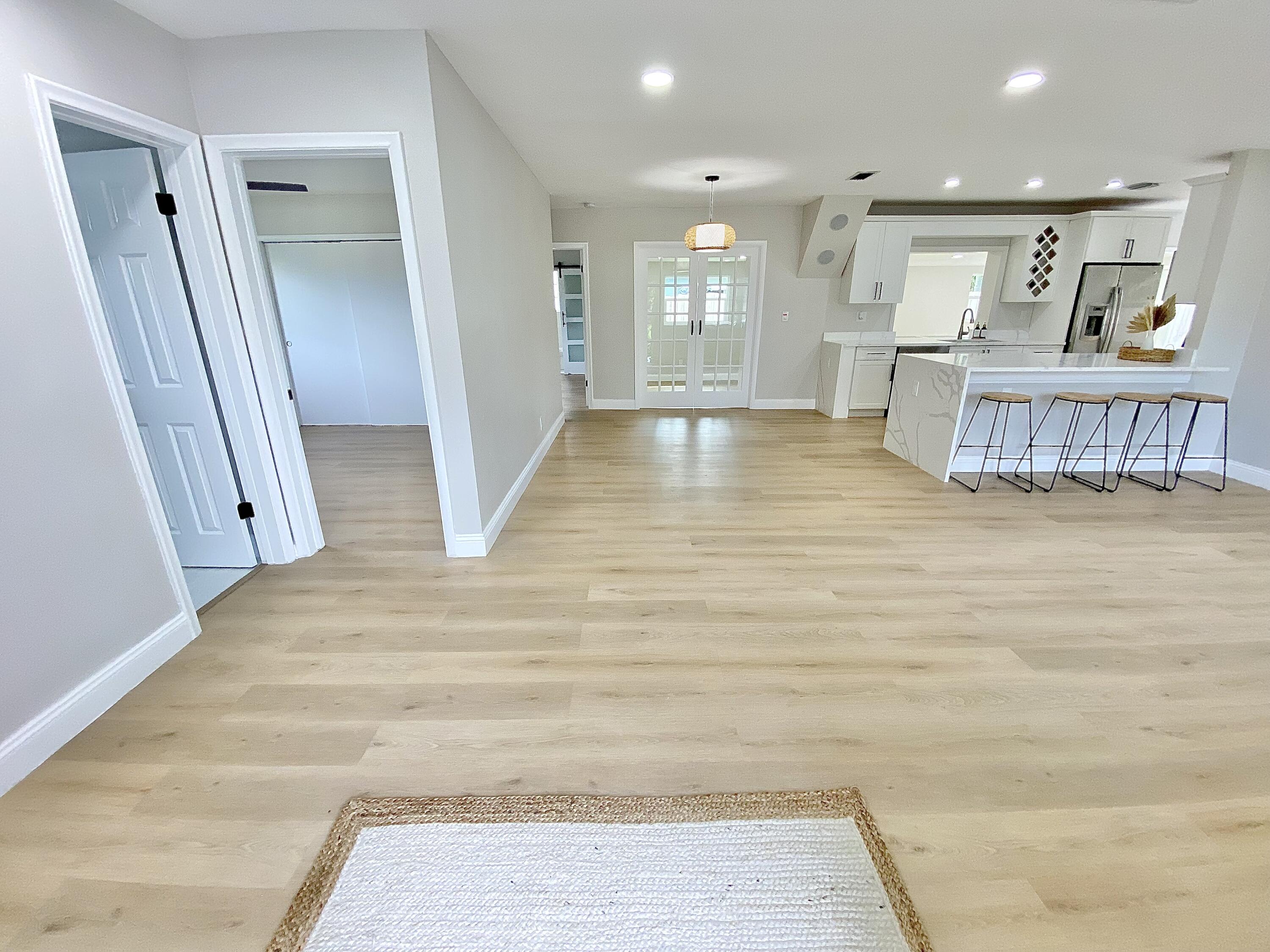 500 Southwest 3rd Avenue Boca Raton, FL 33432 - Photo 7 of 39 a view of a room with wooden floor and cabinet