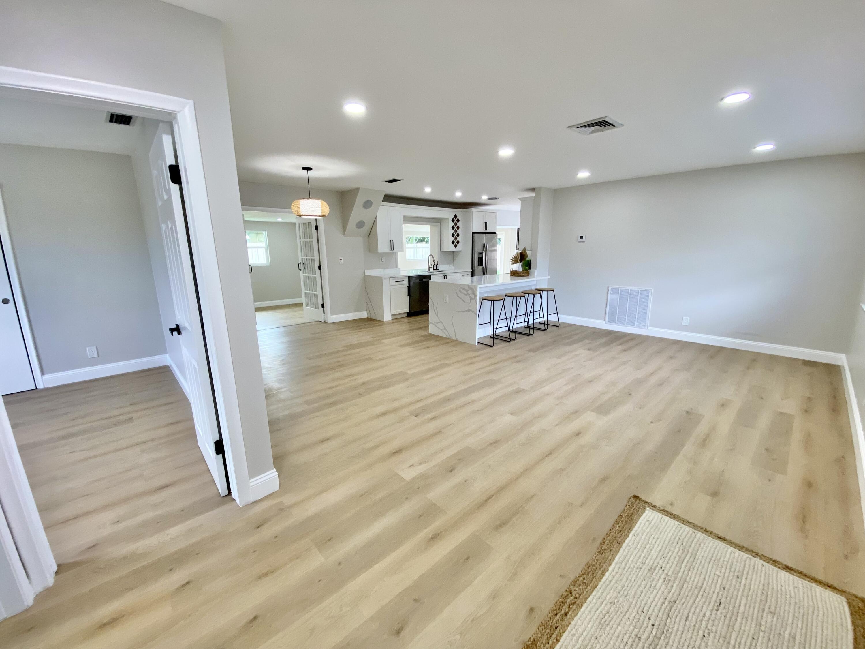 500 Southwest 3rd Avenue Boca Raton, FL 33432 - Photo 8 of 39 a view of empty room with wooden floor
