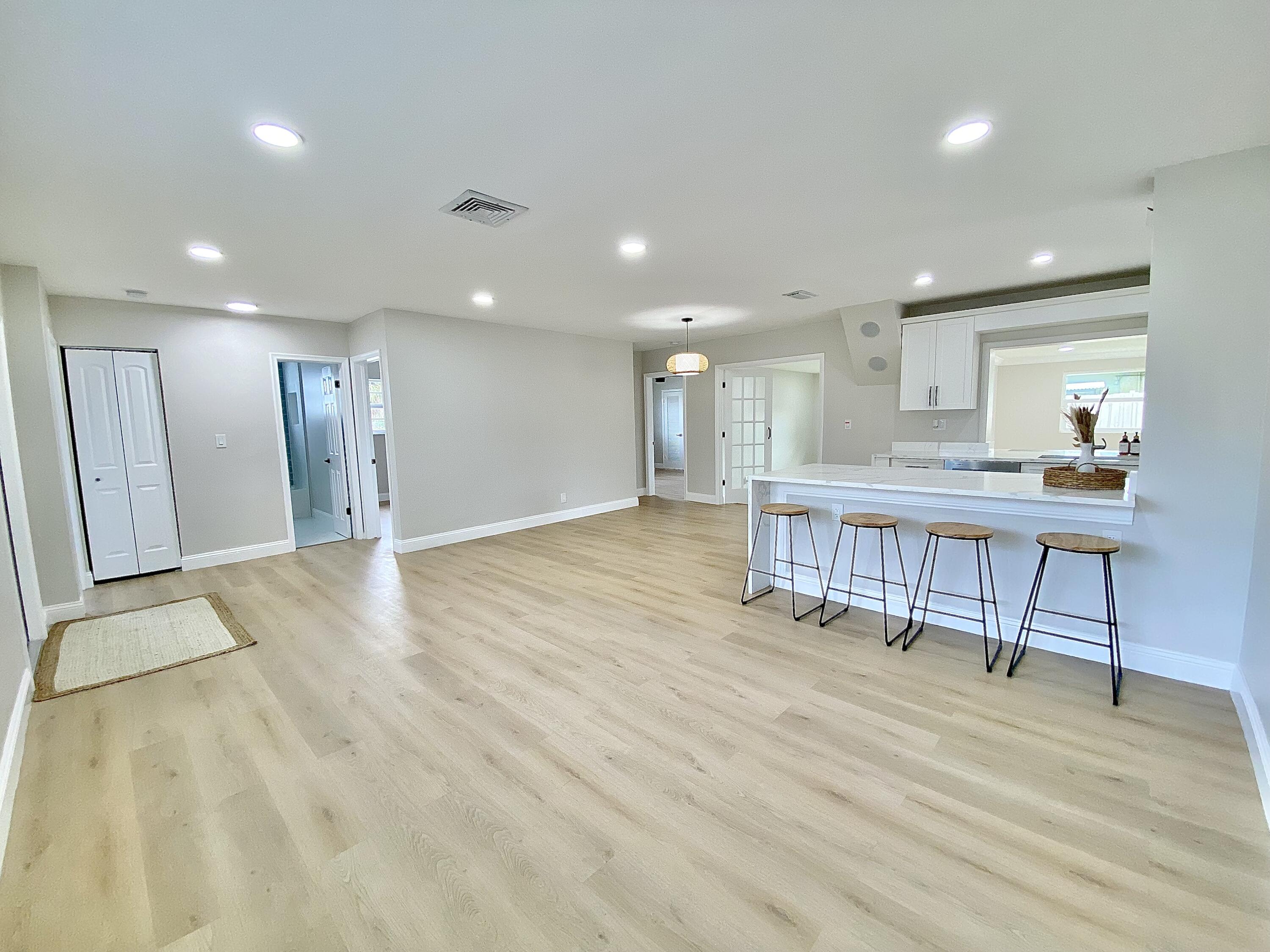 500 Southwest 3rd Avenue Boca Raton, FL 33432 - Photo 9 of 39 a view of a kitchen with a table and chairs