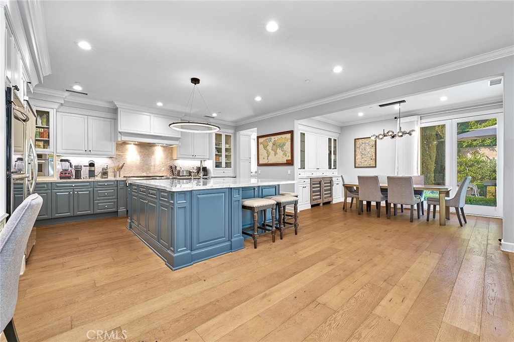 57 Statuary Irvine, CA 92620 - Photo 12 of 66 a kitchen with lots of counter top space and dining table
