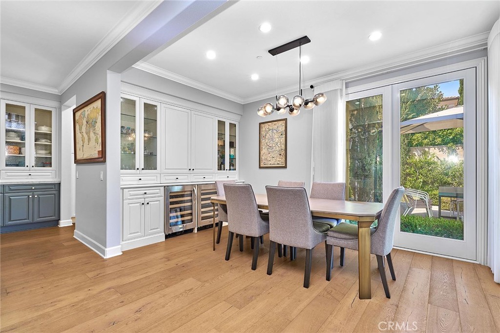 57 Statuary Irvine, CA 92620 - Photo 18 of 66 a view of a dining room with furniture window and wooden floor