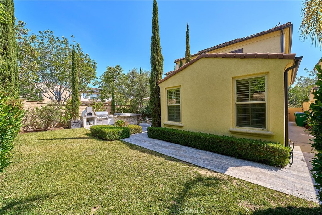 57 Statuary Irvine, CA 92620 - Photo 2 of 66 a view of a house with a yard
