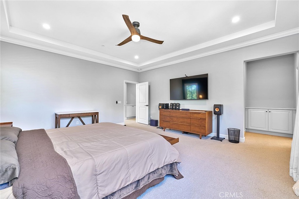 57 Statuary Irvine, CA 92620 - Photo 42 of 66 a bedroom with a bed and a flat tv screen