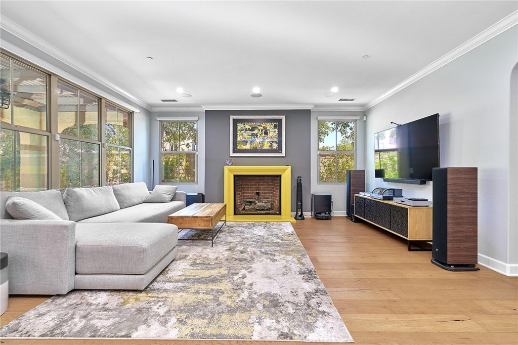 57 Statuary Irvine, CA 92620 - Photo 5 of 66 a living room with furniture large window and a fireplace