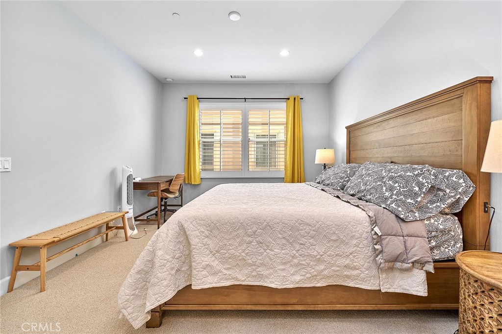 57 Statuary Irvine, CA 92620 - Photo 51 of 66 a bedroom with a bed and window