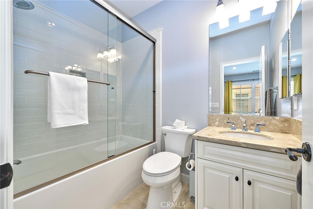 57 Statuary Irvine, CA 92620 - Photo 53 of 66 a bathroom with a sink toilet vanity and shower