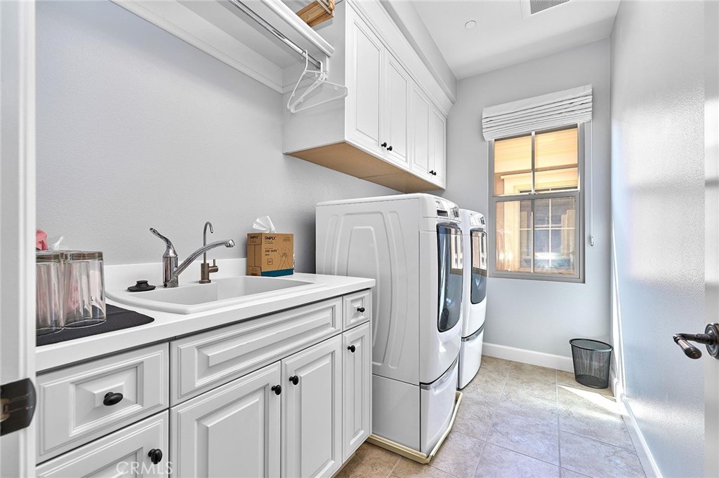 57 Statuary Irvine, CA 92620 - Photo 54 of 66 a utility room with cabinets