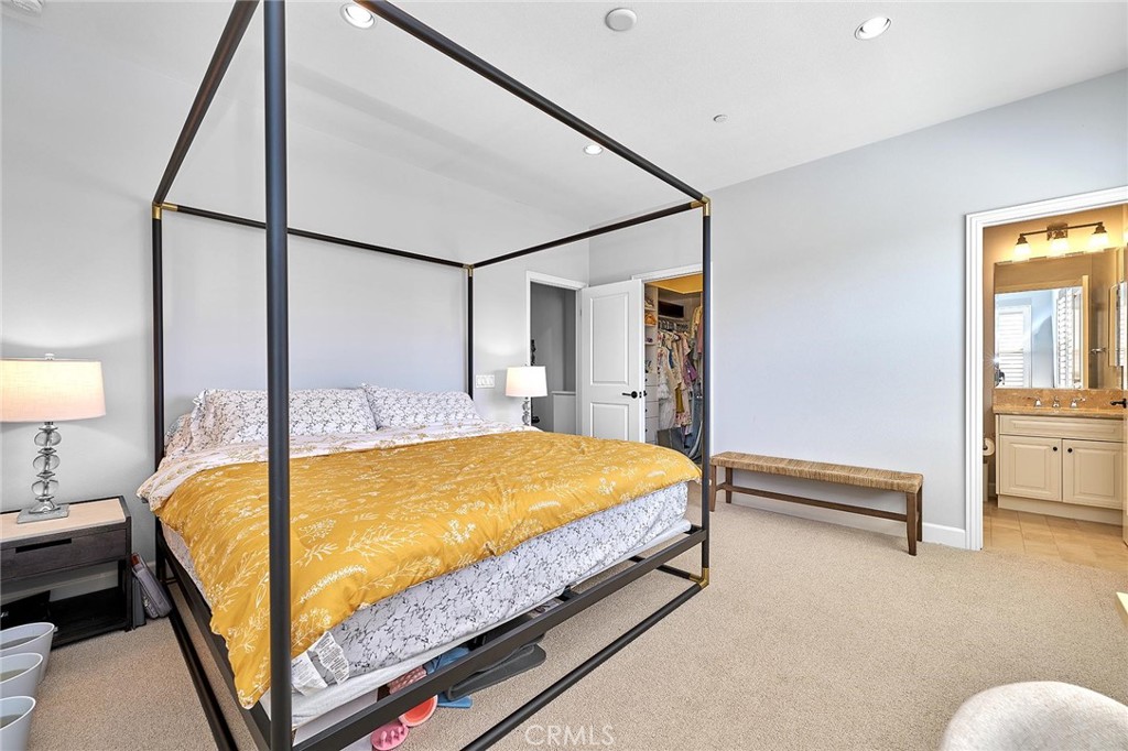 57 Statuary Irvine, CA 92620 - Photo 57 of 66 a bed sitting in a bedroom next to a window