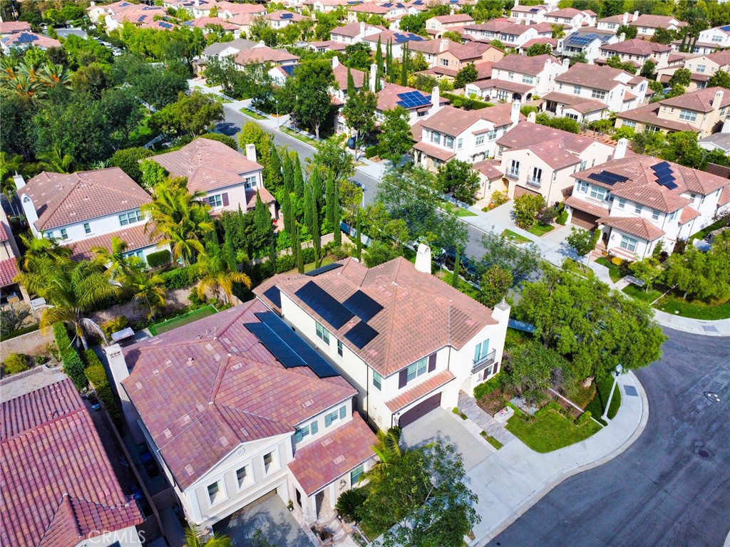 57 Statuary Irvine, CA 92620 - Photo 64 of 66 an aerial view of a house with a garden