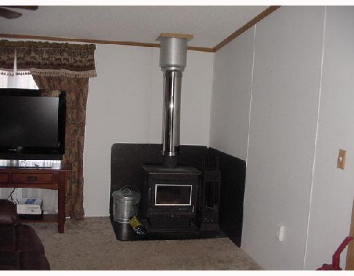 1730 Amity Ridge Road Washington, PA 15301 - Photo 3 of 8 Living Room. Nice sized Living room with wood burning stove....helps with the heating bills too!